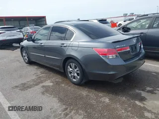 2012 Honda Accord SE z VIN 1HGCP2F66CA195604, wystawiony jako IAAI lot #42073000 z przebiegiem 206 501 mil mil oraz . Historia ofert i sprzedaży dostępna na DreamBid. Obrazek 3.