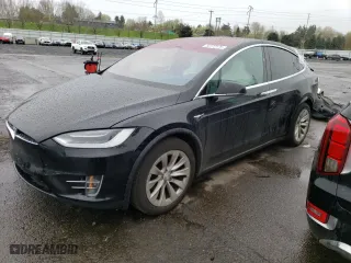 2018 Tesla Model X 75D with VIN 5YJXCBE20JF119875, listed as a Copart auction lot 50772175 with 48,805 mi miles and Salvage Title. Bid and sale history available at carsss.com. Image 1.