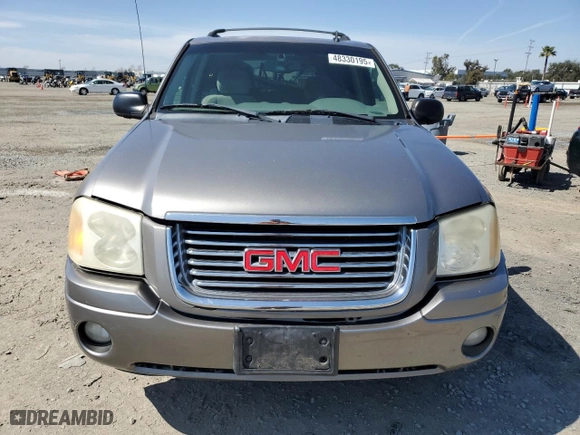 2006 GMC Envoy SLE with VIN 1GKDS13S462126054, listed as a Copart auction lot 48330195 with NaN miles and Salvage Title. Bid and sale history available at carsss.com. Image 5.