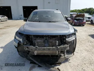 2022 Volkswagen Tiguan SE R-Line Black with VIN 3VVCB7AX6NM081880, listed as a Copart auction lot 54102735 with 52,010 mi miles and Salvage Title. Bid and sale history available at DreamBid. Image 5.
