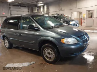 2001 Dodge Caravan Sport with VIN 1B4GP45321B213085, listed as a IAAI auction lot 41529881 with 124,818 mi miles. Bid and sale history available at carsss.com. Image 1.