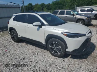 2023 Toyota Corolla Cross Hybrid S with VIN 7MUFBABG5PV008595, listed as a Copart auction lot 60002585 with 9,052 mi miles and Salvage title. Bid and sale history available at DreamBid. Image 4.