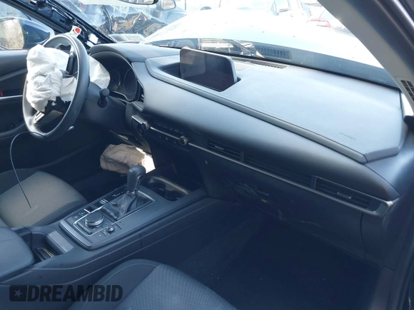 2024 Mazda CX-30 S z VIN 3MVDMBAM8RM634233, wystawiony jako IAAI lot #41820443 z przebiegiem 8 540 mil mil oraz . Historia ofert i sprzedaży dostępna na DreamBid. Obrazek 5.