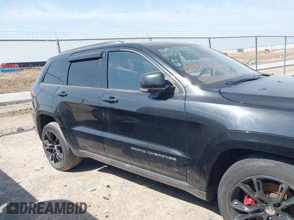 2015 Jeep Grand Cherokee Summit with VIN 1C4RJFJM1FC867861, listed as a IAAI auction lot 42034207 with 92,205 mi miles and . Bid and sale history available at DreamBid. Image 13.