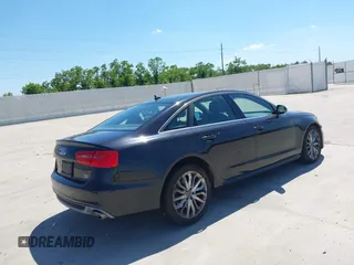 2014 Audi A6 Prestige with VIN WAUHMAFC8EN081609, listed as a IAAI auction lot 42252900 with 170,222 mi miles and . Bid and sale history available at DreamBid. Image 4.