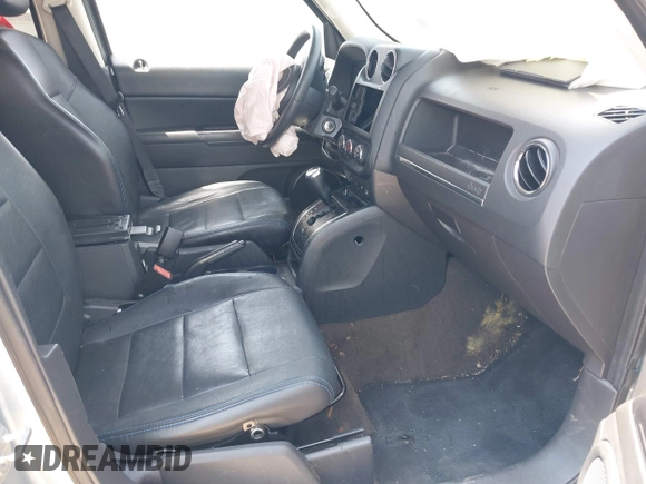 2014 Jeep Patriot Latitude with VIN 1C4NJPFB5ED536401, listed as a IAAI auction lot 42383752 with 68,657 mi miles and . Bid and sale history available at DreamBid. Image 5.