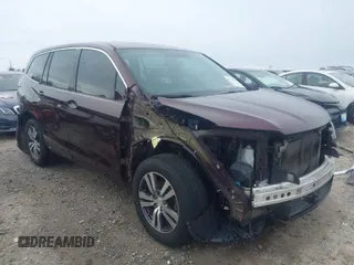 2016 Honda Pilot EX-L with VIN 5FNYF6H52GB109351, listed as a IAAI auction lot 41735131 with 125,604 mi miles. Bid and sale history available at carsss.com. Image 1.