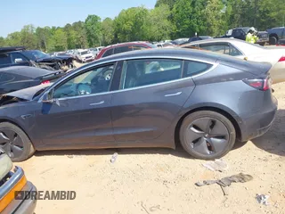 2019 Tesla Model 3 Long Range with VIN 5YJ3E1EB2KF510398, listed as a IAAI auction lot 42067654 with 108,971 mi miles and . Bid and sale history available at DreamBid. Image 13.