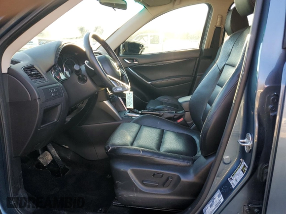 2015 Mazda CX-5 Grand Touring with VIN JM3KE2DY9F0483509, listed as a Copart auction lot 87406944 with 176,213 mi miles and Salvage Title. Bid and sale history available at carsss.com. Image 7.