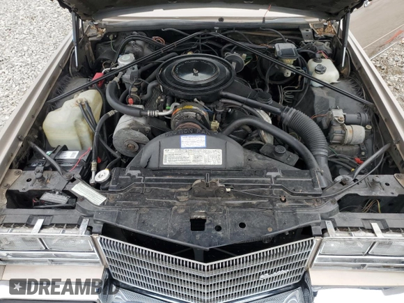 1985 Cadillac Eldorado z VIN 1G6EL5788FE655155, wystawiony jako Copart lot #73223134 z przebiegiem 68 676 mil mil oraz Tytuł czysty. Historia ofert i sprzedaży dostępna na DreamBid. Obrazek 11.