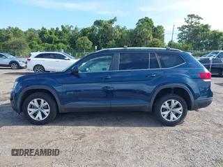 2018 Volkswagen Atlas SE with VIN 1V2CR2CA1JC561003, listed as a IAAI auction lot 42556798 with 124,147 mi miles and . Bid and sale history available at DreamBid. Image 14.