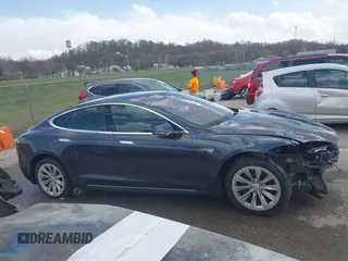 2016 Tesla Model S 70 with VIN 5YJSA1E14GF157118, listed as a IAAI auction lot 41794381 with 53,651 mi miles and . Bid and sale history available at DreamBid. Image 14.
