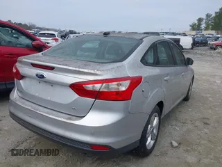 2013 Ford Focus SE with VIN 1FADP3F26DL338245, listed as a IAAI auction lot 41529378 with 176,736 mi miles and . Bid and sale history available at DreamBid. Image 4.