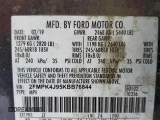 2019 Ford Edge SEL with VIN 2FMPK4J95KBB76844, listed as a Copart auction lot 59323925 with 122,326 mi miles and Salvage title. Bid and sale history available at DreamBid. Image 13.