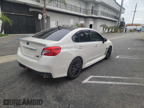 2016 Subaru WRX STI Limited with VIN JF1VA2Z66G9810377, listed as a Copart auction lot 63947825 with 125,625 mi miles and Clean title. Bid and sale history available at DreamBid. Image 4.