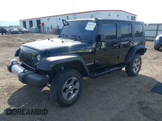 2009 Jeep Wrangler Unlimited X with VIN 1J4GA391X9L701403, listed as a IAAI auction lot 41890659 with 143,619 mi miles. Bid and sale history available at carsss.com. Image 2.