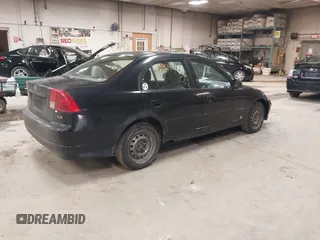 2004 Honda Civic LX with VIN 2HGES165X4H517818, listed as a IAAI auction lot 42164416 with 164,918 mi miles and . Bid and sale history available at carsss.com. Image 4.