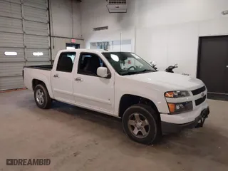 2009 Chevrolet Colorado LT w/1LT with VIN 1GCCS139998119199, listed as a IAAI auction lot 41595641 with 174,604 mi miles. Bid and sale history available at carsss.com. Image 1.
