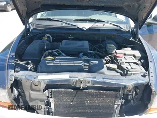 2003 Dodge Dakota SLT with VIN 1D7HL48N63S158682, listed as a IAAI auction lot 41964332 with 278,390 mi miles. Bid and sale history available at carsss.com. Image 10.