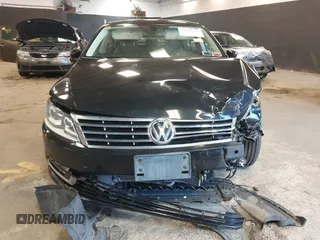 2015 Volkswagen CC R-Line with VIN WVWBP7AN8FE828106, listed as a IAAI auction lot 41867821 with 67,067 mi miles and . Bid and sale history available at DreamBid. Image 12.