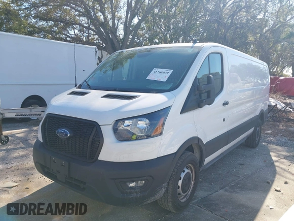 2023 Ford Transit Cargo with VIN 1FTBR1Y82PKA22661, listed as a IAAI auction lot 41768039 with 30,800 mi miles and . Bid and sale history available at DreamBid. Image 18.