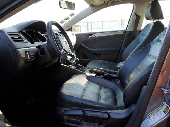 2015 Volkswagen Jetta Sedan 1.8T SE with VIN 3VWD07AJ7FM267463, listed as a Copart auction lot 89084895 with 106,789 mi miles and Salvage Title. Bid and sale history available at carsss.com. Image 7.