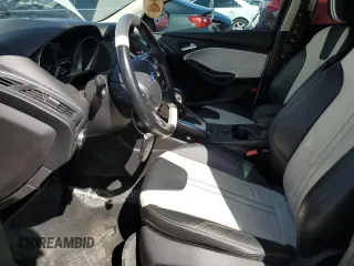 2014 Ford Focus Titanium with VIN 1FADP3J26EL132223, listed as a Copart auction lot 71490004 with 131,233 mi miles and Salvage Title. Bid and sale history available at DreamBid. Image 7.