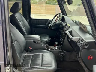 2002 Mercedes-Benz G with VIN WDCYR49E72X133986, listed as a Copart auction lot 54624435 with 138,597 mi miles and Salvage Title. Bid and sale history available at carsss.com. Image 5.
