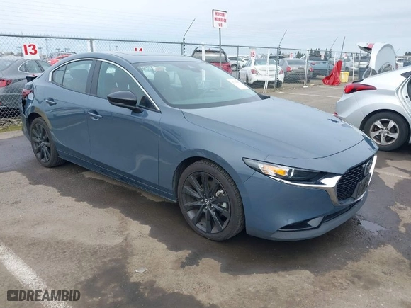 2023 Mazda Mazda3 Sedan 2.5 S Carbon Edition with VIN 3MZBPBCM4PM358964, listed as a IAAI auction lot 41718813 with 34,215 mi miles. Bid and sale history available at carsss.com. Image 1.