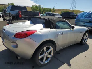 2006 Pontiac Solstice z VIN 1G2MB33B16Y107714, wystawiony jako Copart lot #70491744 z przebiegiem 53 925 mil mil oraz Szkoda całkowita • Salvage title. Historia ofert i sprzedaży dostępna na DreamBid. Obrazek 3.