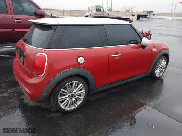 2015 MINI Cooper Hardtop S with VIN WMWXP7C55FT740223, listed as a IAAI auction lot 41576344 with NaN miles. Bid and sale history available at carsss.com. Image 4.