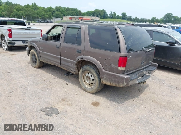 1999 Oldsmobile Bravada z VIN 1GHDT13W3X2710047, wystawiony jako IAAI lot #42481978 z przebiegiem Nie podano mil oraz . Historia ofert i sprzedaży dostępna na DreamBid. Obrazek 3.