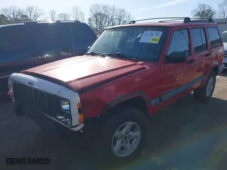 1999 Jeep Cherokee Sport with VIN 1J4FT68S5XL624177, listed as a IAAI auction lot 41730776 with 216,152 mi miles. Bid and sale history available at carsss.com. Image 15.