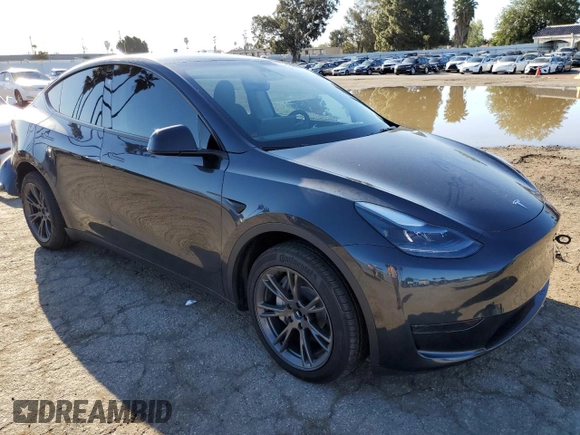 2024 Tesla Model Y with VIN 7SAYGDED3RF151031, listed as a Copart auction lot 49494165 with 7,503 mi miles and Salvage Title. Bid and sale history available at DreamBid. Image 4.