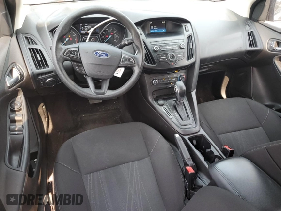 2018 Ford Focus SE z VIN 1FADP3F2XJL228407, wystawiony jako Copart lot #59254415 z przebiegiem 75 241 mil mil oraz Szkoda całkowita • Salvage title. Historia ofert i sprzedaży dostępna na DreamBid. Obrazek 8.