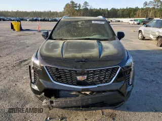 2023 Cadillac XT4 FWD Luxury with VIN 1GYAZAR49PF102307, listed as a Copart auction lot 49342465 with 21,093 mi miles and Salvage Title. Bid and sale history available at DreamBid. Image 5.