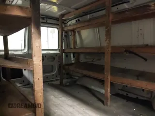 2007 Ford Econoline Cargo Commercial with VIN 1FTNE14W47DA86573, listed as a IAAI auction lot 41294485 with 197,325 mi miles and . Bid and sale history available at DreamBid. Image 8.