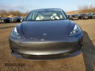 2023 Tesla Model 3 Long Range with VIN 5YJ3E1EBXPF660900, listed as a Copart auction lot 48923265 with 9,954 mi miles and Salvage Title. Bid and sale history available at DreamBid. Image 5.
