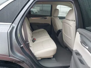 2020 Cadillac XT5 Premium Luxury FWD with VIN 1GYKNCRS2LZ139766, listed as a IAAI auction lot 41949393 with 59,335 mi miles and . Bid and sale history available at carsss.com. Image 8.