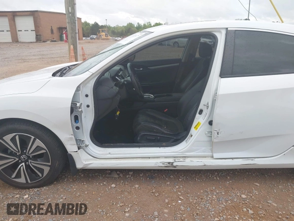 2017 Honda Civic EX-L with VIN 2HGFC1F72HH658763, listed as a IAAI auction lot 41972317 with 166,168 mi miles and . Bid and sale history available at DreamBid. Image 6.