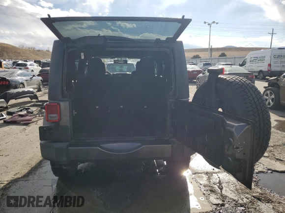 2017 Jeep Wrangler Unlimited Sahara with VIN 1C4HJWEG4HL615069, listed as a Copart auction lot 46480225 with 104,723 mi miles and Salvage title. Bid and sale history available at DreamBid. Image 6.