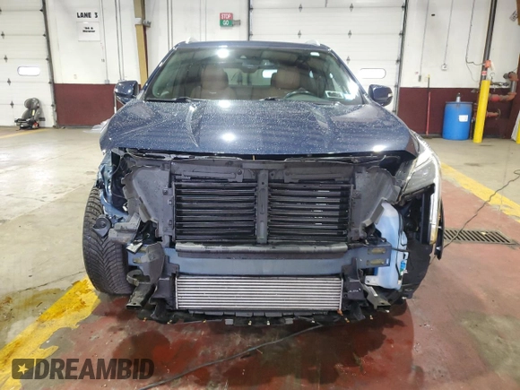 2021 Cadillac XT4 AWD Premium Luxury with VIN 1GYFZDR41MF031543, listed as a Copart auction lot 61085805 with 21,318 mi miles and Salvage title. Bid and sale history available at DreamBid. Image 5.