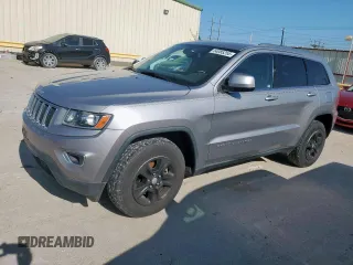 2014 Jeep Grand Cherokee Laredo with VIN 1C4RJEAG4EC182773, listed as a Copart auction lot 54085255 with 138,775 mi miles and Salvage Title. Bid and sale history available at DreamBid. Image 1.