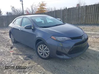 2018 Toyota Corolla L z VIN 5YFBURHE1JP811217, wystawiony jako IAAI lot #40953703 z przebiegiem 241 005 mil mil oraz . Historia ofert i sprzedaży dostępna na DreamBid. Obrazek 1.