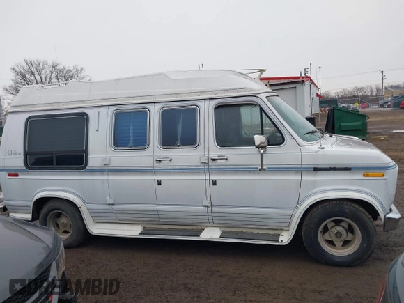 1991 Ford Econoline Cargo with VIN 1FDEE14H6MHA05266, listed as a IAAI auction lot 41538798 with 133,537 mi miles and . Bid and sale history available at DreamBid. Image 13.