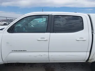 2017 Toyota Tacoma SR5 z VIN 5TFCZ5ANXHX065886, wystawiony jako IAAI lot #42308228 z przebiegiem 294 931 mil mil oraz . Historia ofert i sprzedaży dostępna na DreamBid. Obrazek 14.