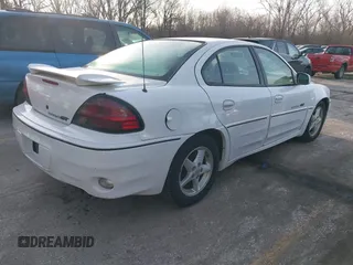 2001 Pontiac Grand Am GT with VIN 1G2NW52EX1C147666, listed as a IAAI auction lot 41689955 with 189,598 mi miles. Bid and sale history available at carsss.com. Image 4.