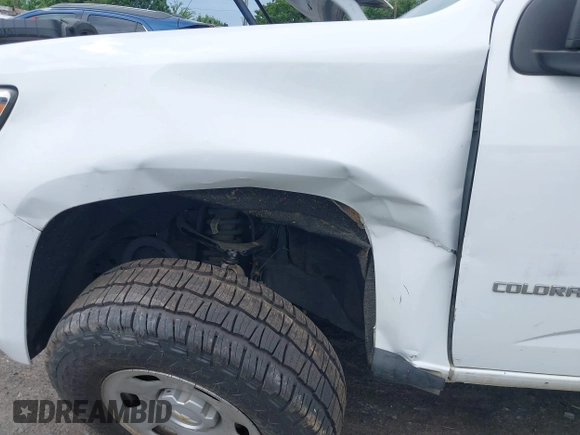 2019 Chevrolet Colorado 4WD Work Truck z VIN 1GCHTBEA5K1221307, wystawiony jako IAAI lot #42273653 z przebiegiem 94 746 mil mil oraz . Historia ofert i sprzedaży dostępna na DreamBid. Obrazek 6.
