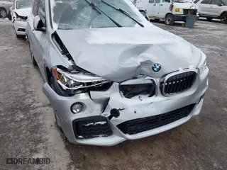 2016 BMW X1 xDrive28i with VIN WBXHT3C3XG5E51358, listed as a IAAI auction lot 41730597 with 90,010 mi miles. Bid and sale history available at carsss.com. Image 6.