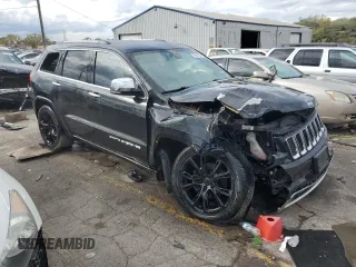 2014 Jeep Grand Cherokee Overland with VIN 1C4RJECG1EC556155, listed as a Copart auction lot 75641034 with 116,549 mi miles and Salvage Title. Bid and sale history available at carsss.com. Image 4.